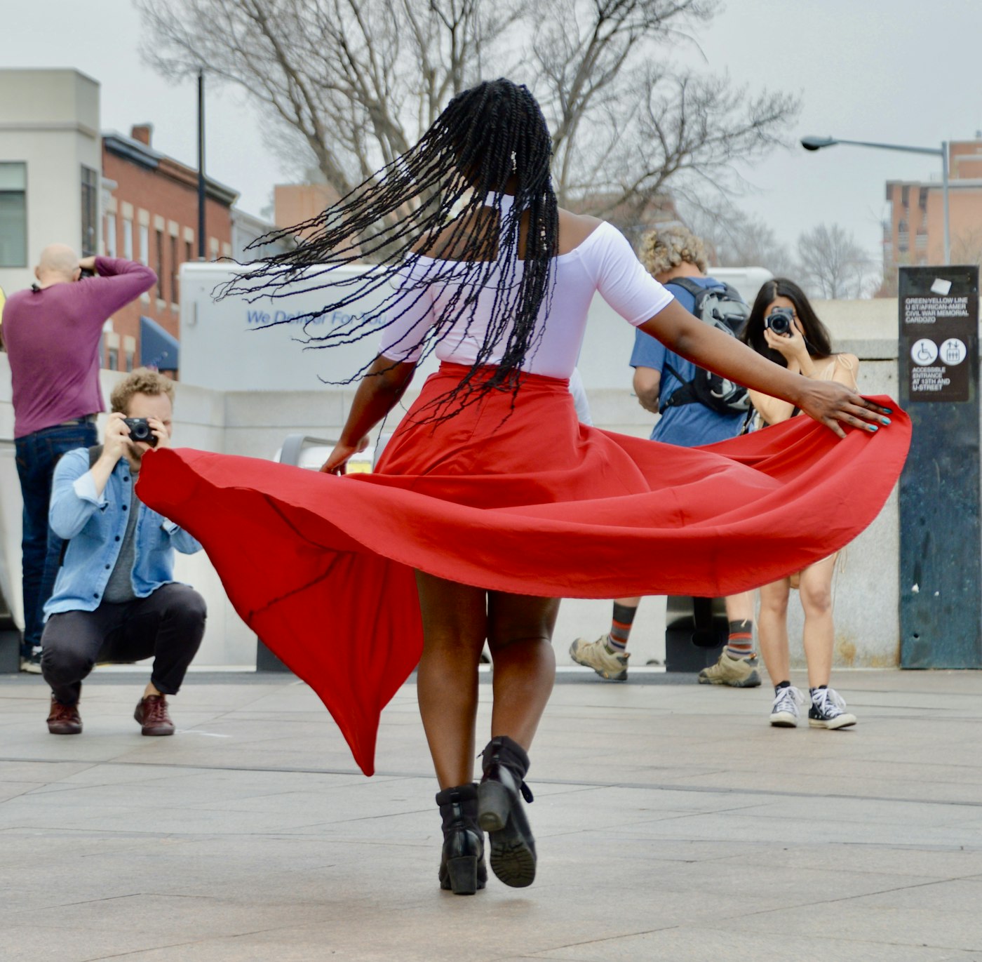A dancer twirling a red skirt